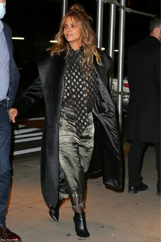 American actress Halle Berry is wearing the SENTALER Suri Alpaca Long Shawl Collar Wrap Coat in Black at night in New York.