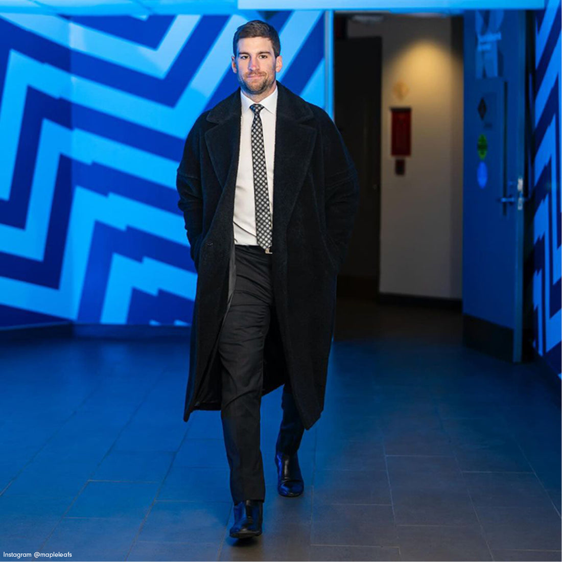 Toronto Maple Leafs Captain John Tavares is wearing the SENTALER MEN Technical Bouclé Alpaca Robe Coat in Black.