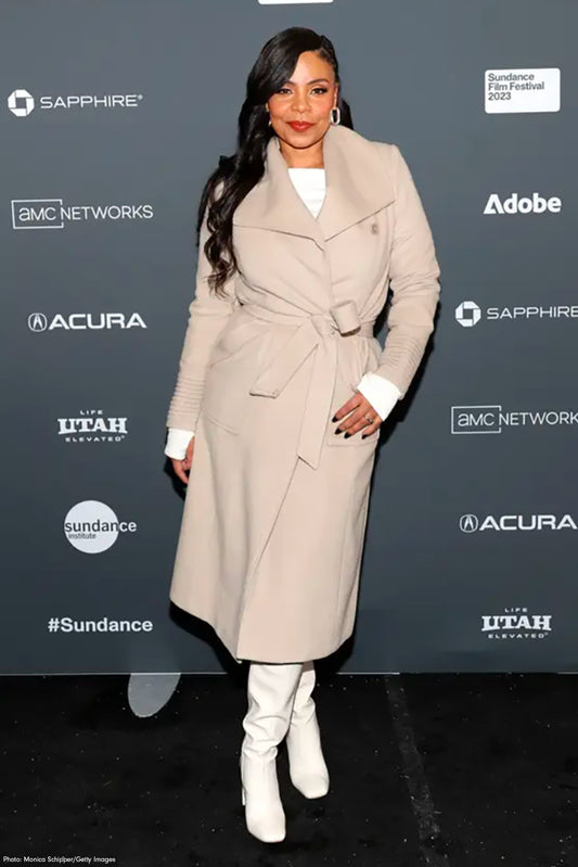 American actress Sanaa Lathan is wearing the SENTALER Long Wide Collar Wrap Coat in Bleeker Beige.