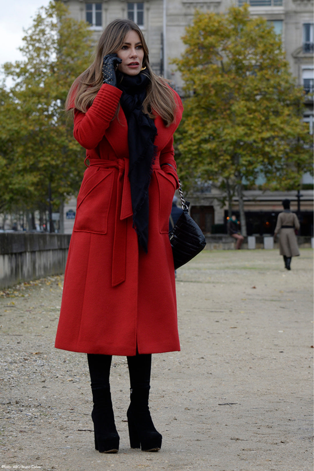 Columbian-American actress and television personality Sofia Vergara is wearing the SENTALER Long Wide Collar Wrap Coat in Scarlet Red filming outside on set in Paris.