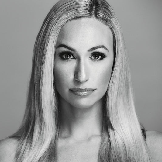 Image features the Audi logo and a headshot image of designer, founder, president and creative director  of SENTALER, Bojana Sentaler in black and white.