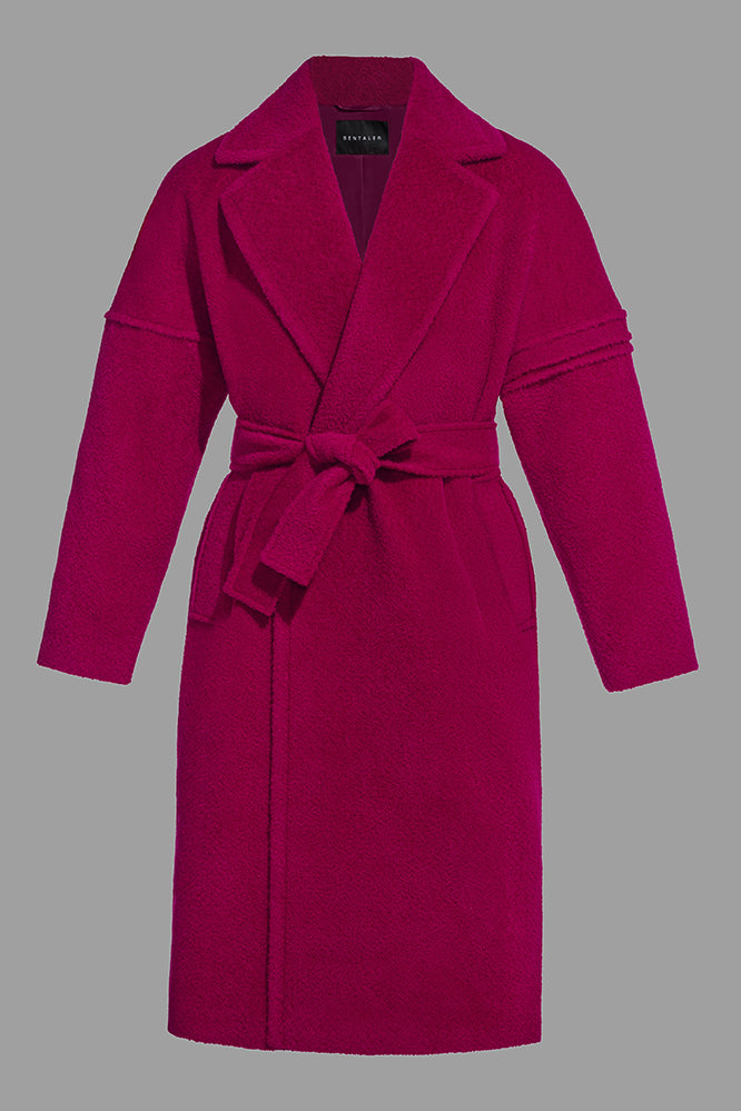 Image features the FASHION logo and an off-figure image of the Sentaler Technical Bouclé Alpaca Robe Coat featured in Technical Bouclé Alpaca and available in Fuchsia Pink.