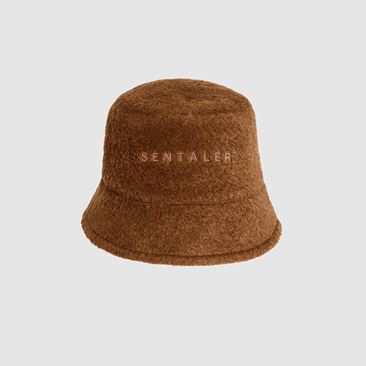 Image features the FASHION logo and an off-figure image of the Sentaler Mens Bouclé Alpaca Bucket Hat featured in Bouclé Alpaca and available in Caramel Café.