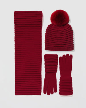 Sentaler women’s garnet red ribbed winter accessories set including hat, scarf, and gloves made of Baby Alpaca fabric, displayed on a white background.