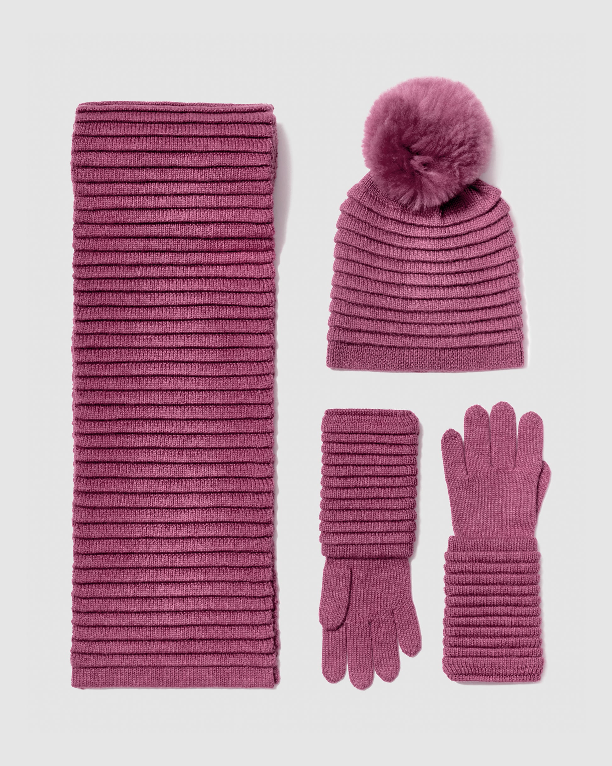 Sentaler women’s mauve pink ribbed winter accessories set including hat, scarf, and gloves made of Baby Alpaca fabric, displayed on a white background.