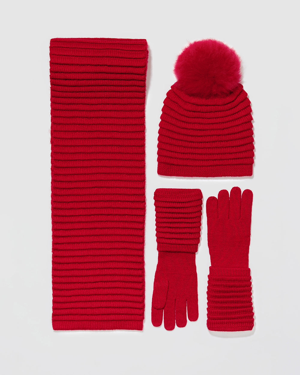 Sentaler women’s red ribbed winter accessories set including hat, scarf, and gloves made of Baby Alpaca fabric, displayed on a white background.