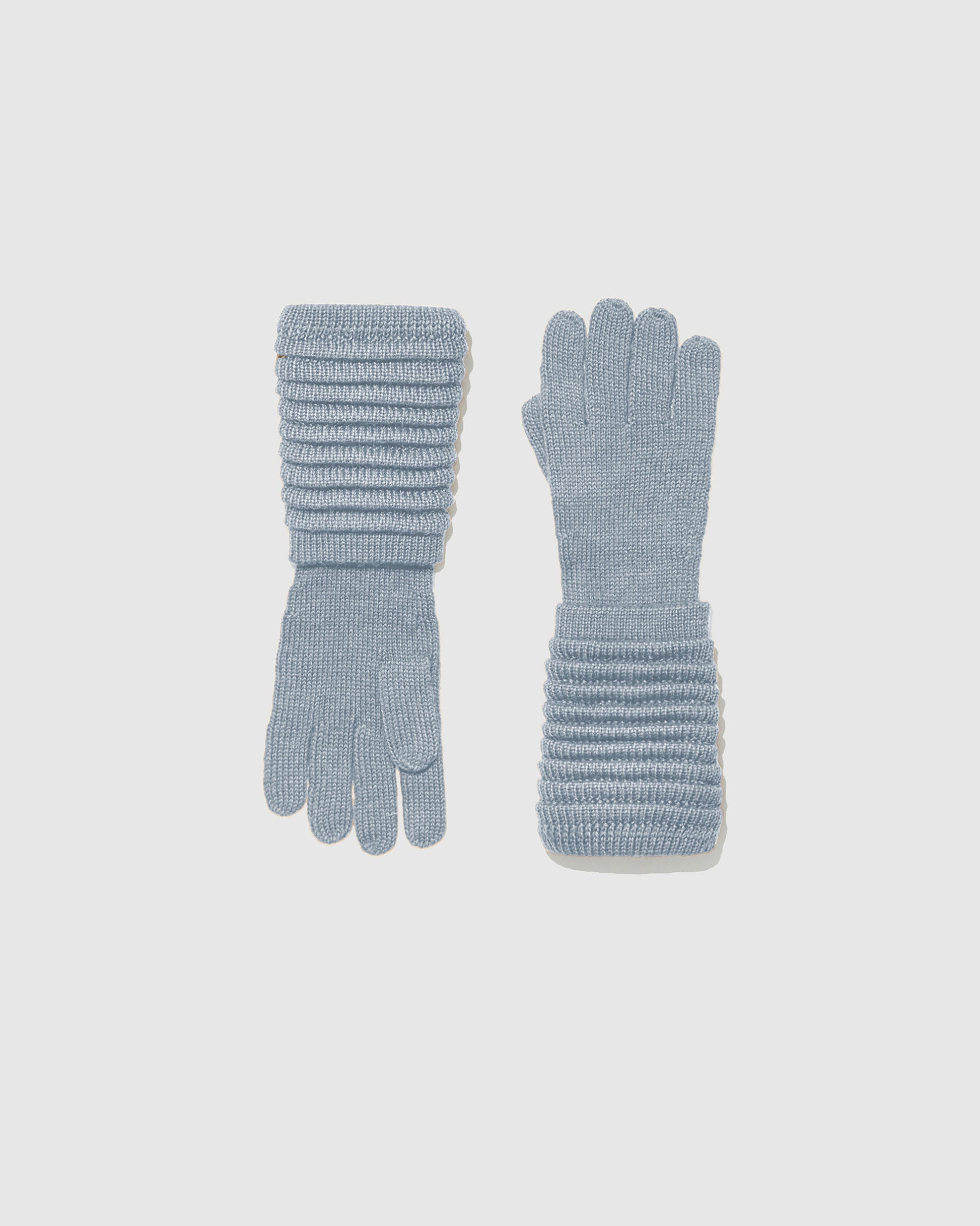 Sentaler women’s glacial blue ribbed winter gloves made of Baby Alpaca fabric, displayed on a white background.