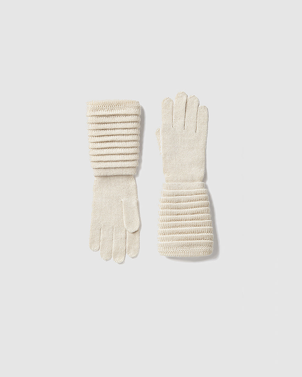 Sentaler Adult Ribbed Ivory Gloves in Baby Alpaca yarn. Seen as off figure.