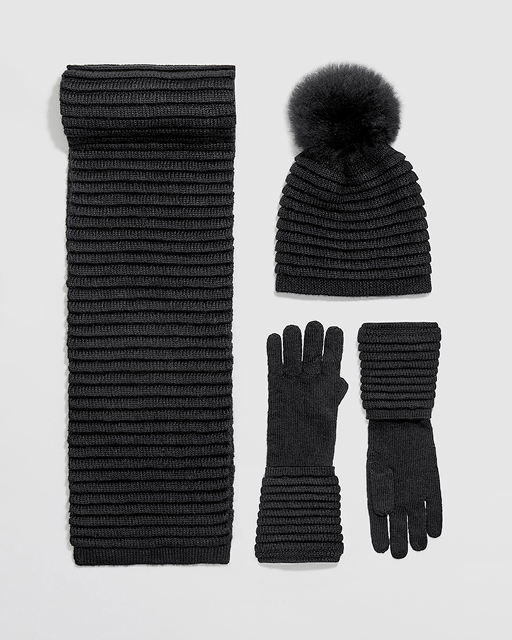 Sentaler women’s black ribbed winter accessories set including hat, scarf, and gloves made of Baby Alpaca fabric displayed on a white background.