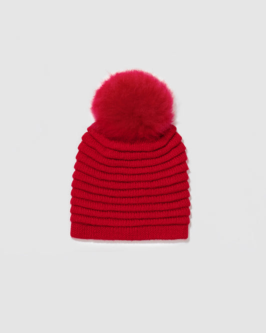 Sentaler Adult Ribbed Red Hat With Fur Pompon in Baby Alpaca yarn. Seen as off figure.