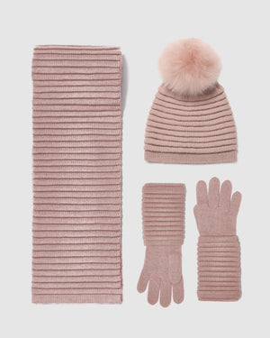 Sentaler women’s blush pink ribbed winter accessories set including hat, scarf, and gloves made of Baby Alpaca fabric displayed on a white background.