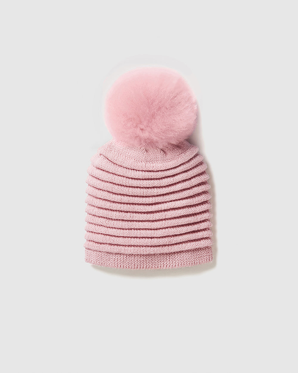 Sentaler Adult Ribbed Pink Hat With Fur Pompon in Baby Alpaca yarn. Seen as off figure.