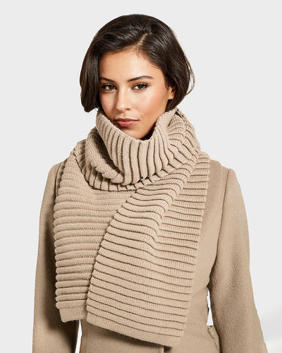 Sentaler Adult Ribbed Camel Scarf in Baby Alpaca yarn. Seen from front close up on female model.