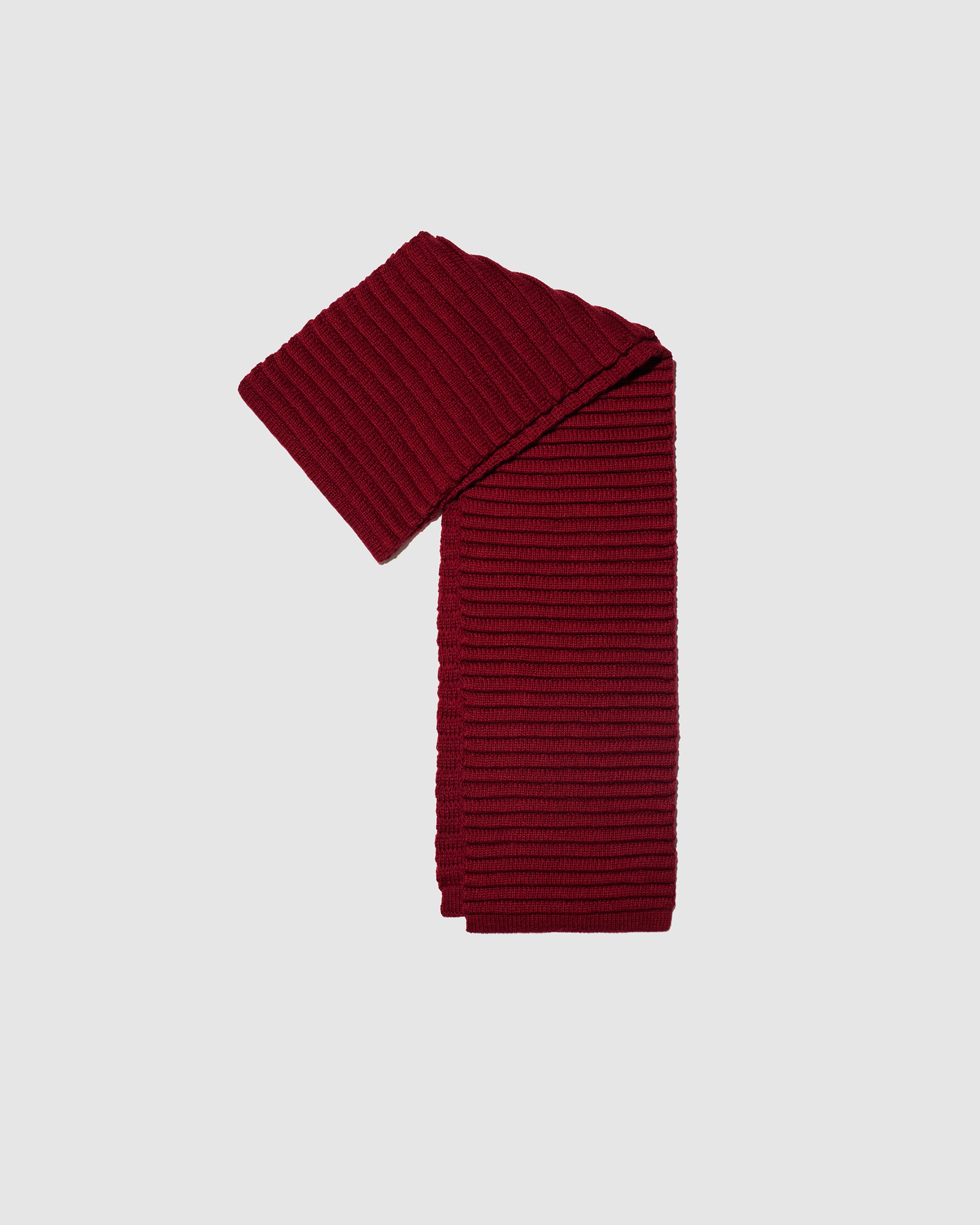 Sentaler women’s garnet red ribbed winter scarf made of Baby Alpaca fabric displayed on a white background.