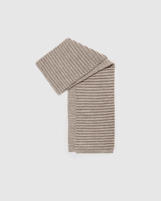 Sentaler women’s light taupe ribbed winter scarf made of Baby Alpaca fabic displayed on a white background.