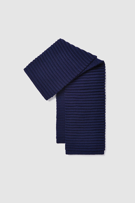 Sentaler Adult Ribbed Scarf crafted in Baby Alpaca and in Navy. Seen off model.