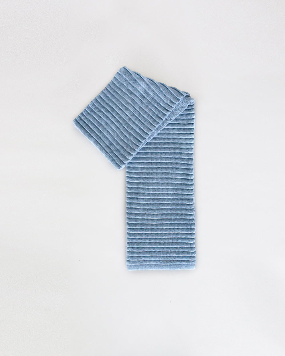 Sentaler Adult Ribbed Powder Blue Scarf in Baby Alpaca yarn. Seen as folded off figure.