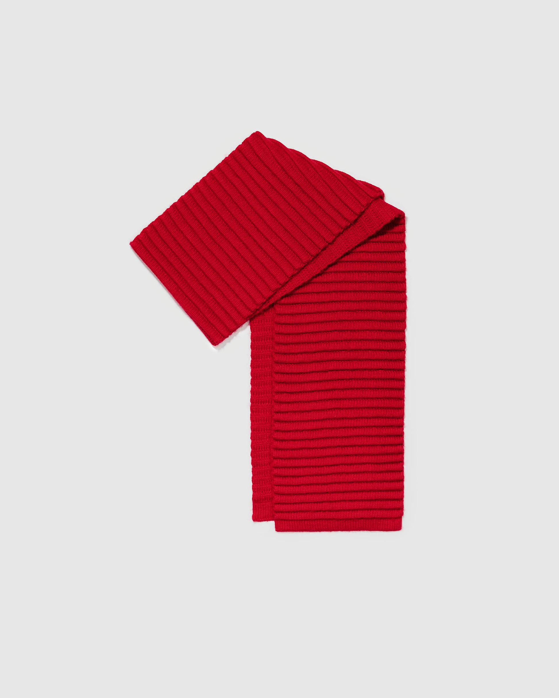 Sentaler women’s red ribbed winter scarf made of Baby Alpaca fabric displayed on a white background.