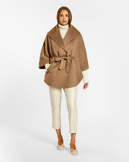 Sentaler Dark Camel Cape with Shawl Collar and Belt in Baby Alpaca wool. Seen from front belted on female model.