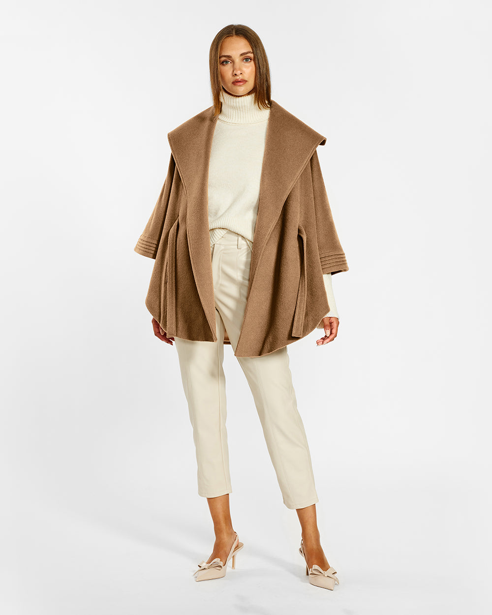 Sentaler Dark Camel Cape with Shawl Collar and Belt in Baby Alpaca wool. Seen from front open on female model.