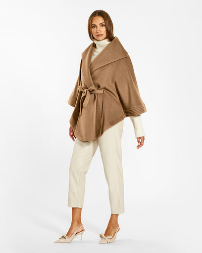 Sentaler Dark Camel Cape with Shawl Collar and Belt in Baby Alpaca wool. Seen from side belted on female model.