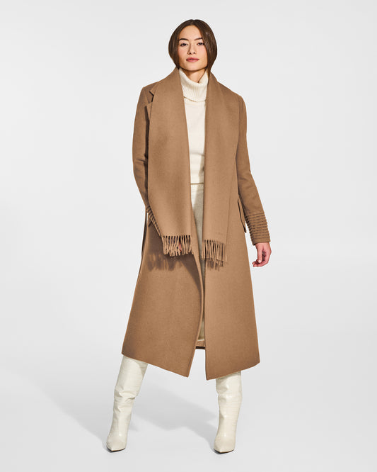 Front view of model wearing Sentaler's adult Dark Camel classic scarf, made of baby alpaca yarn. 