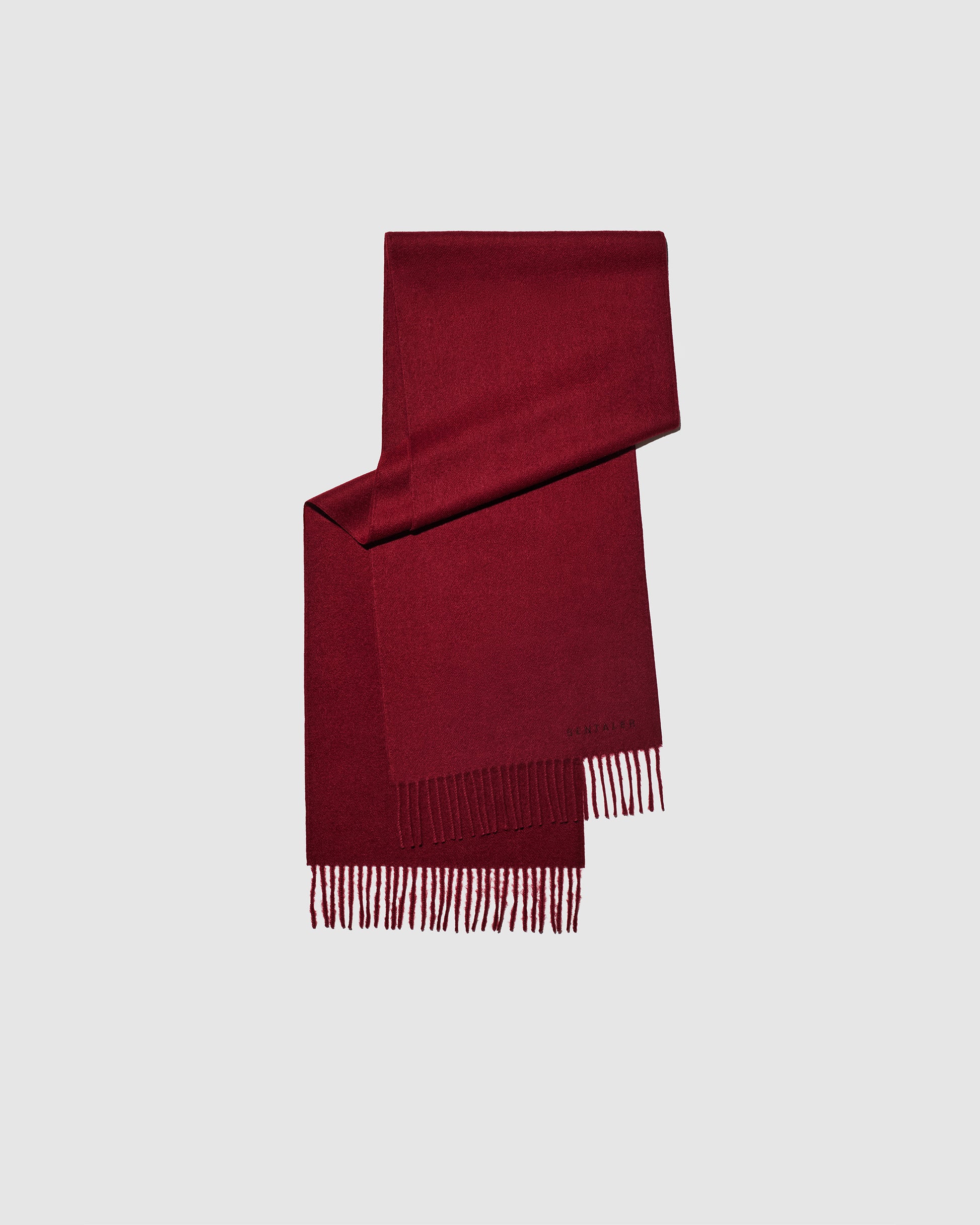 Sentaler Garnet Red Baby Alpaca Classic Scarf in Alpaca yarn displayed on a white background. 