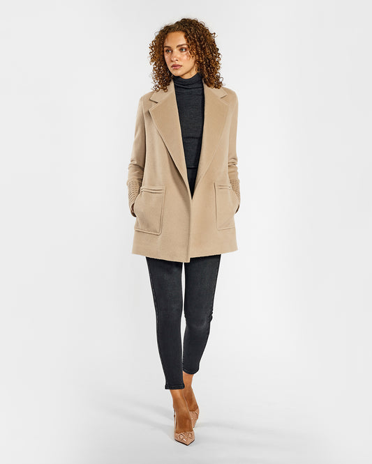 Sentaler Cropped Notched Collar Square Pocket Wrap Camel Coat in Baby Alpaca wool. Seen from front open on female model.