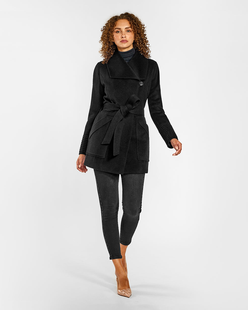 Sentaler Cropped Wide Collar Wrap Black Coat in Baby Alpaca wool. Seen from front belted on female model.