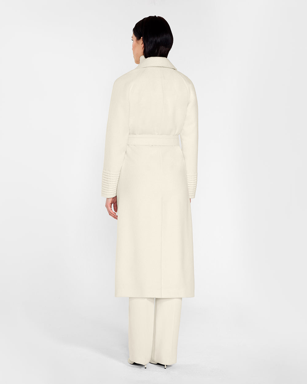 Sentaler Long Notched Collar Raglan Sleeve Wrap Ivory Coat in Baby Alpaca wool. Seen from back on female model.