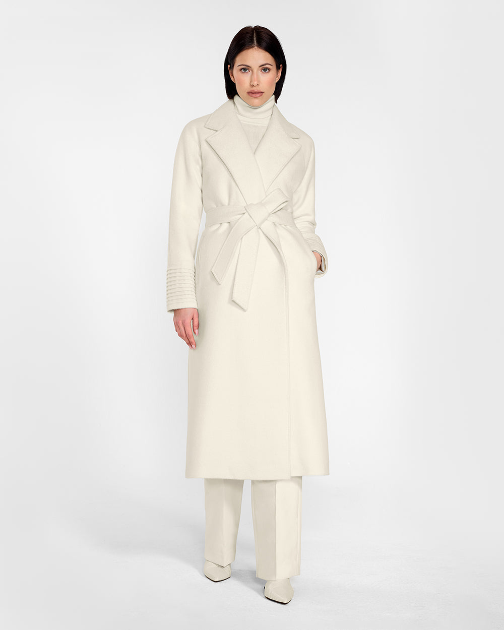 Sentaler Long Notched Collar Raglan Sleeve Wrap Ivory Coat in Baby Alpaca wool. Seen from front on female model.