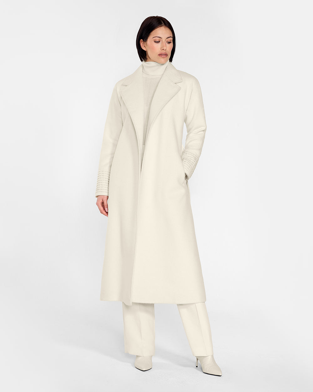 Sentaler Long Notched Collar Raglan Sleeve Wrap Ivory Coat in Baby Alpaca wool. Seen from front open on female model.