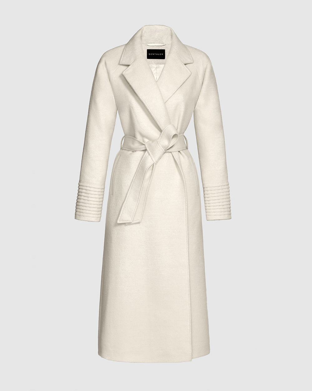 Sentaler Long Notched Collar Raglan Sleeve Wrap Ivory Coat in Baby Alpaca wool. Seen as belted off figure.