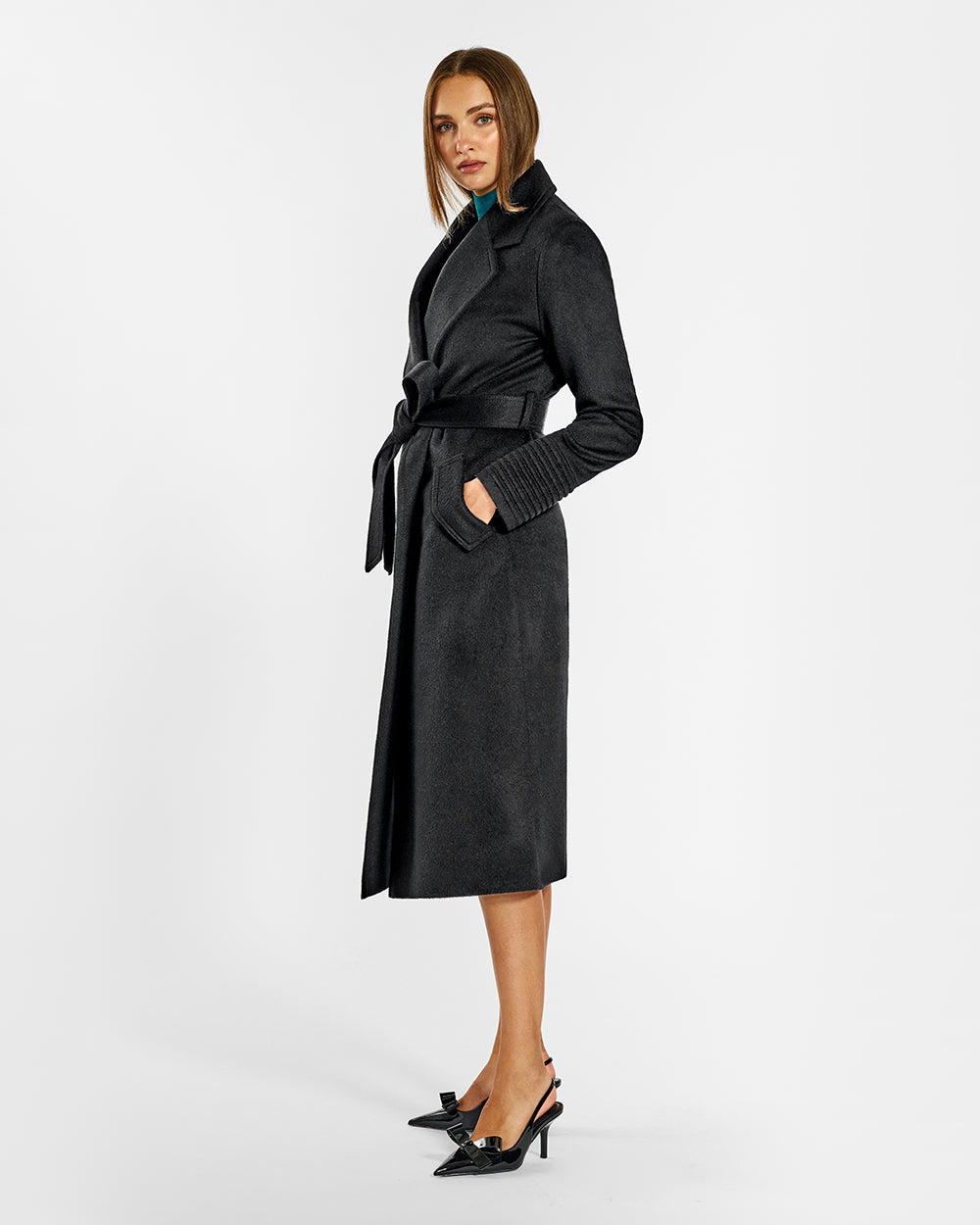 Sentaler Long Notched Collar Wrap Black Coat in Baby Alpaca wool. Seen from side belted on female model.