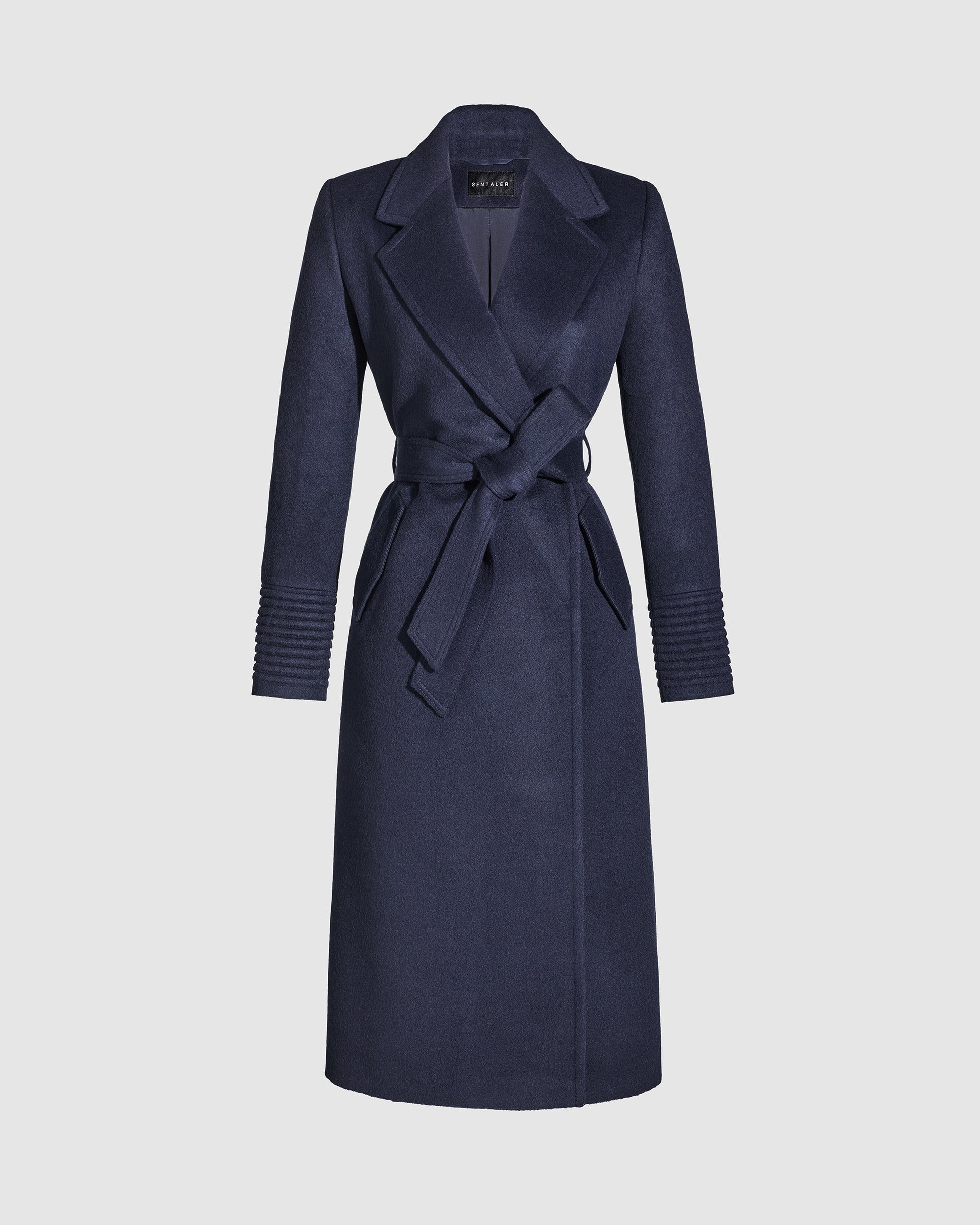 Sentaler long deep navy wrap coat with notched collar in baby alpaca wool, shown belted.