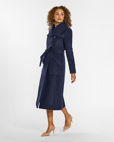 Sentaler Long Wide Collar Wrap Deep Navy Coat in Baby Alpaca wool. Seen from side belted on female model.