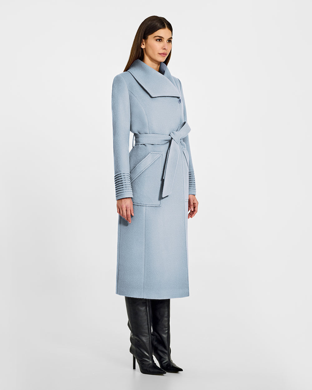 Sentaler Long Wide Collar Wrap Glacial Blue Coat in Baby Alpaca wool. Seen from side belted on female model.