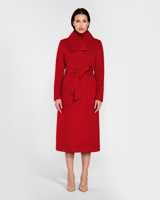 Front view of model wearing a Sentaler scarlet red long wrap coat made of baby alpaca wool, with a wide collar, worn belted.