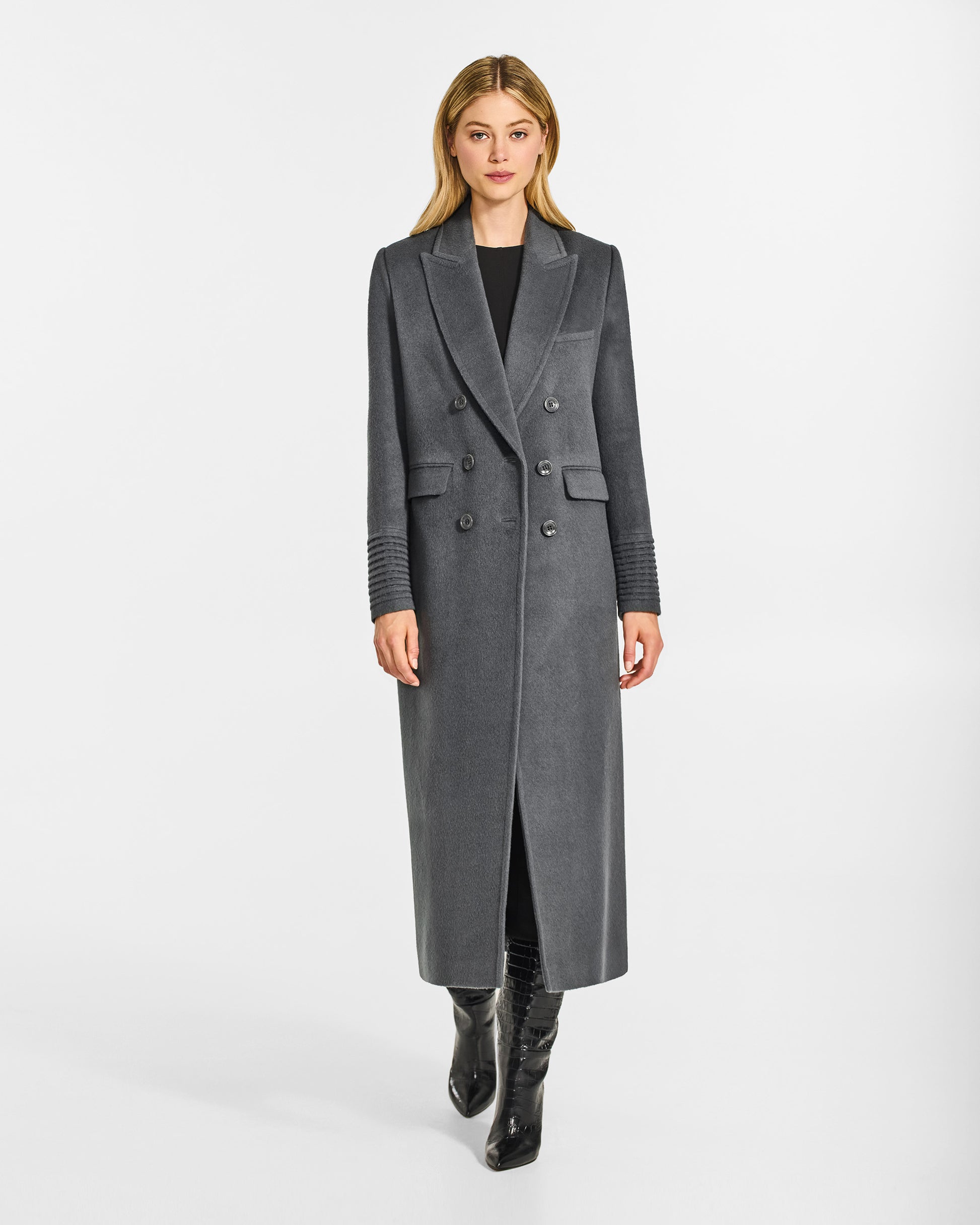 Front view of model wearing a Sentaler graphite grey double breasted maxi coat made of baby alpaca wool, with a peak collar, worn buttoned.