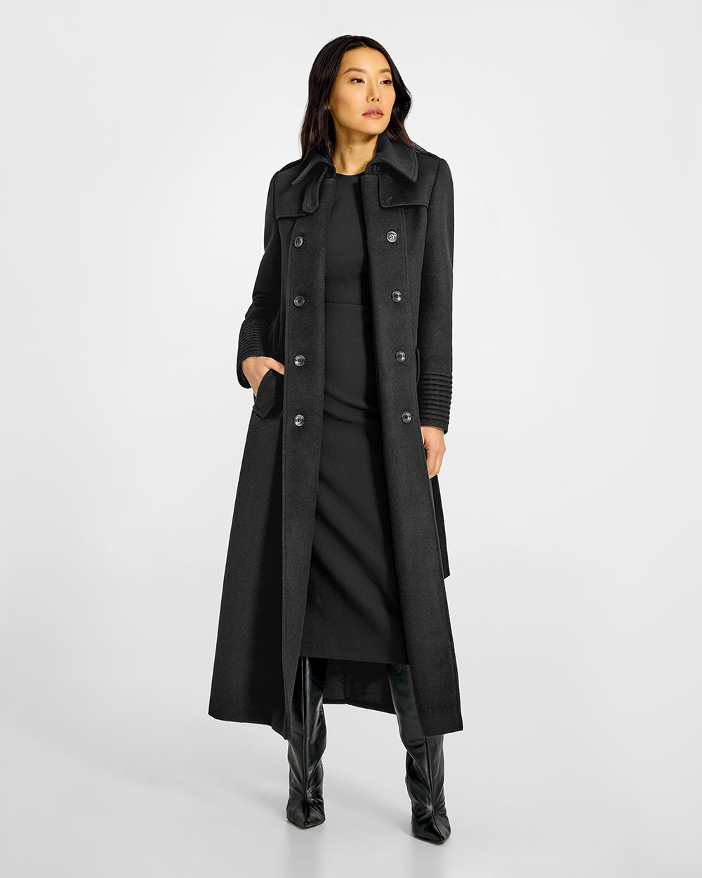 Sentaler Maxi Trench Black Coat in Baby Alpaca wool. Seen from front open and buttoned lapel on female model.