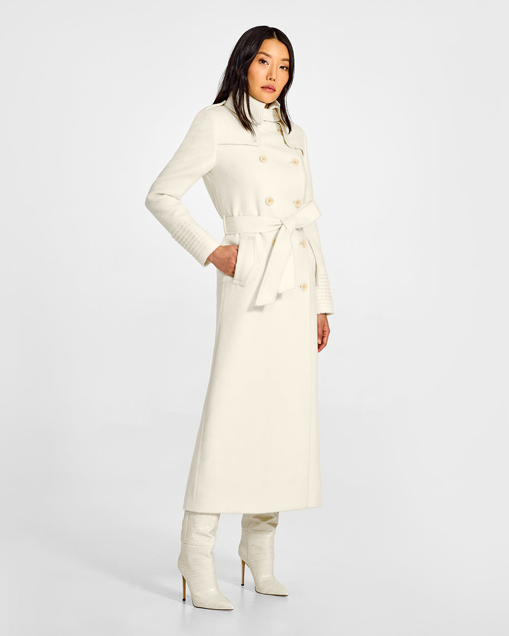 Sentaler Maxi Trench Ivory Coat in Baby Alpaca wool. Seen from side belted on female model.