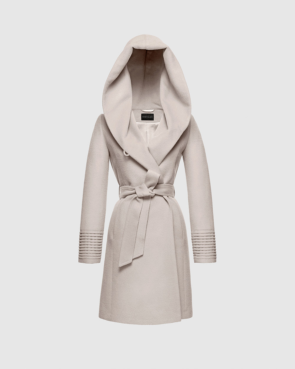 Sentaler Mid Length Hooded Wrap Bleeker Beige Coat in Baby Alpaca wool. Seen as belted off figure with hood.