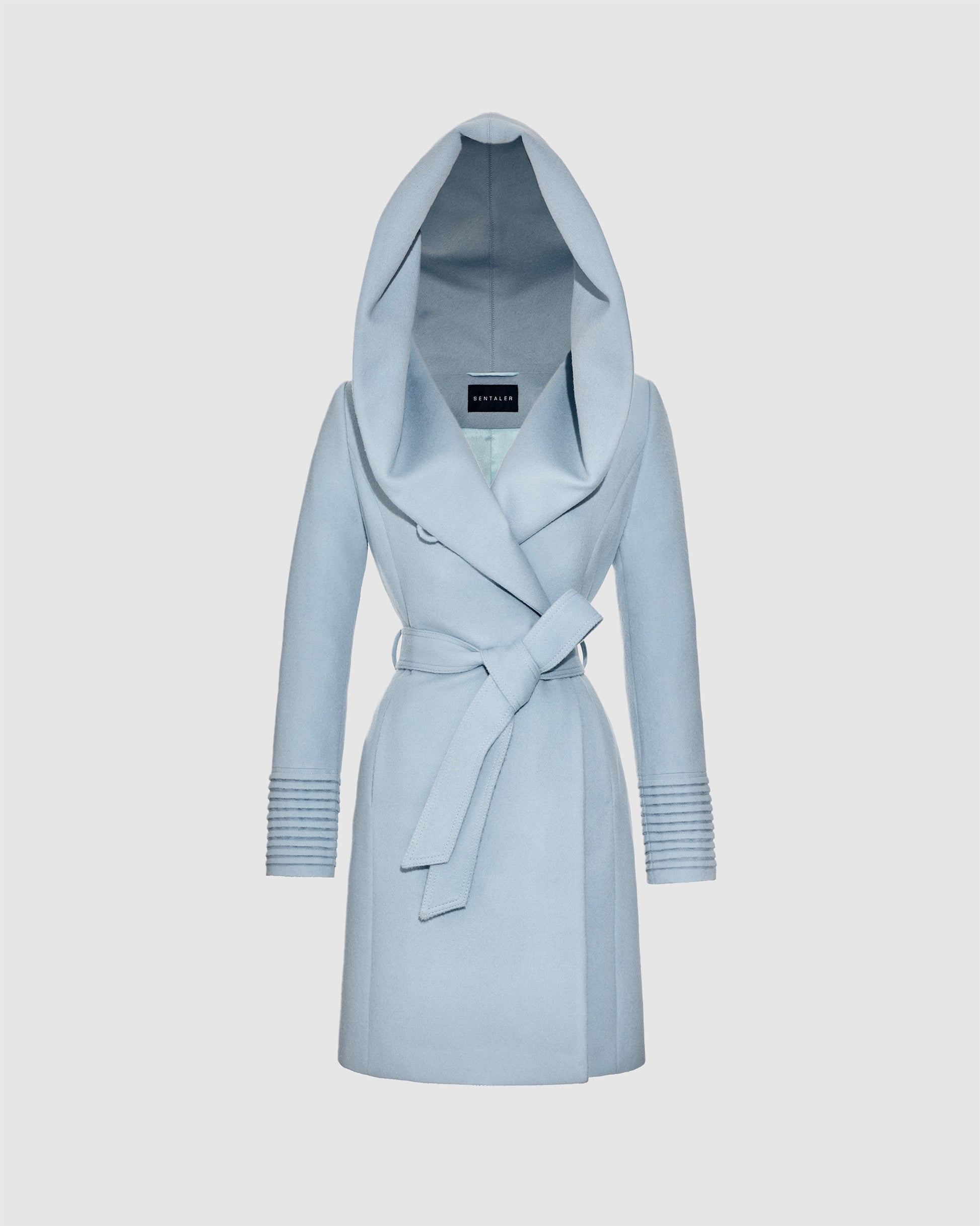 Sentaler mid length glacial blue coat made of baby alpaca wool with a hooded collar, belted.