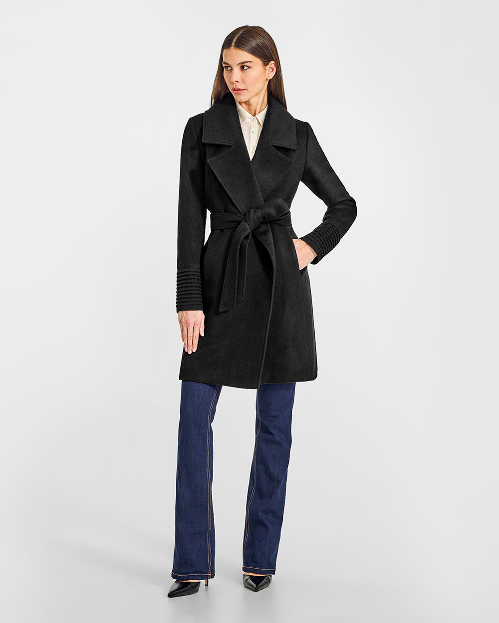 Sentaler Mid Length Large Notched Collar Wrap Black Coat in Baby Alpaca wool. Seen from front belted on female model.