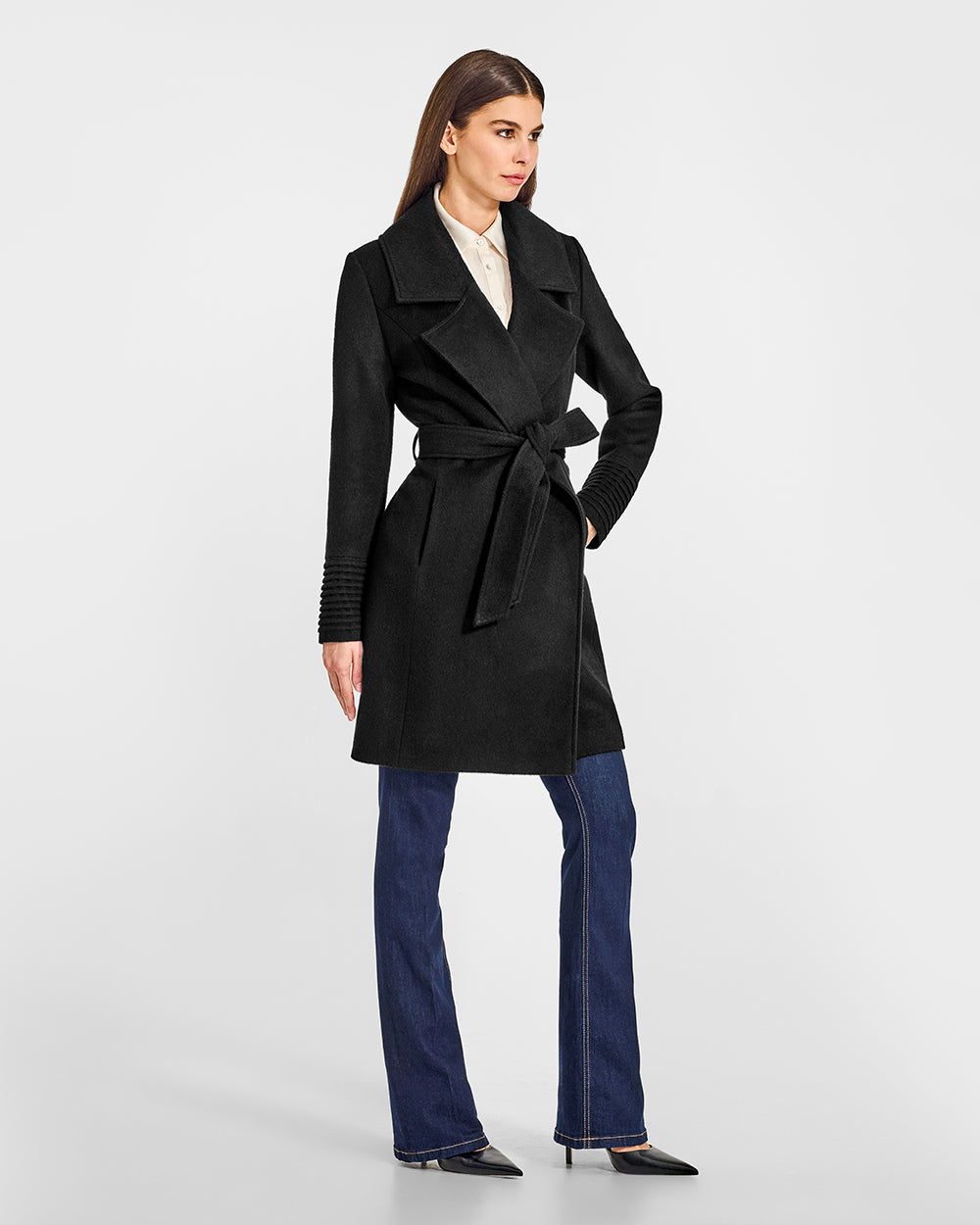 Sentaler Mid Length Large Notched Collar Wrap Black Coat in Baby Alpaca wool. Seen from side belted on female model.