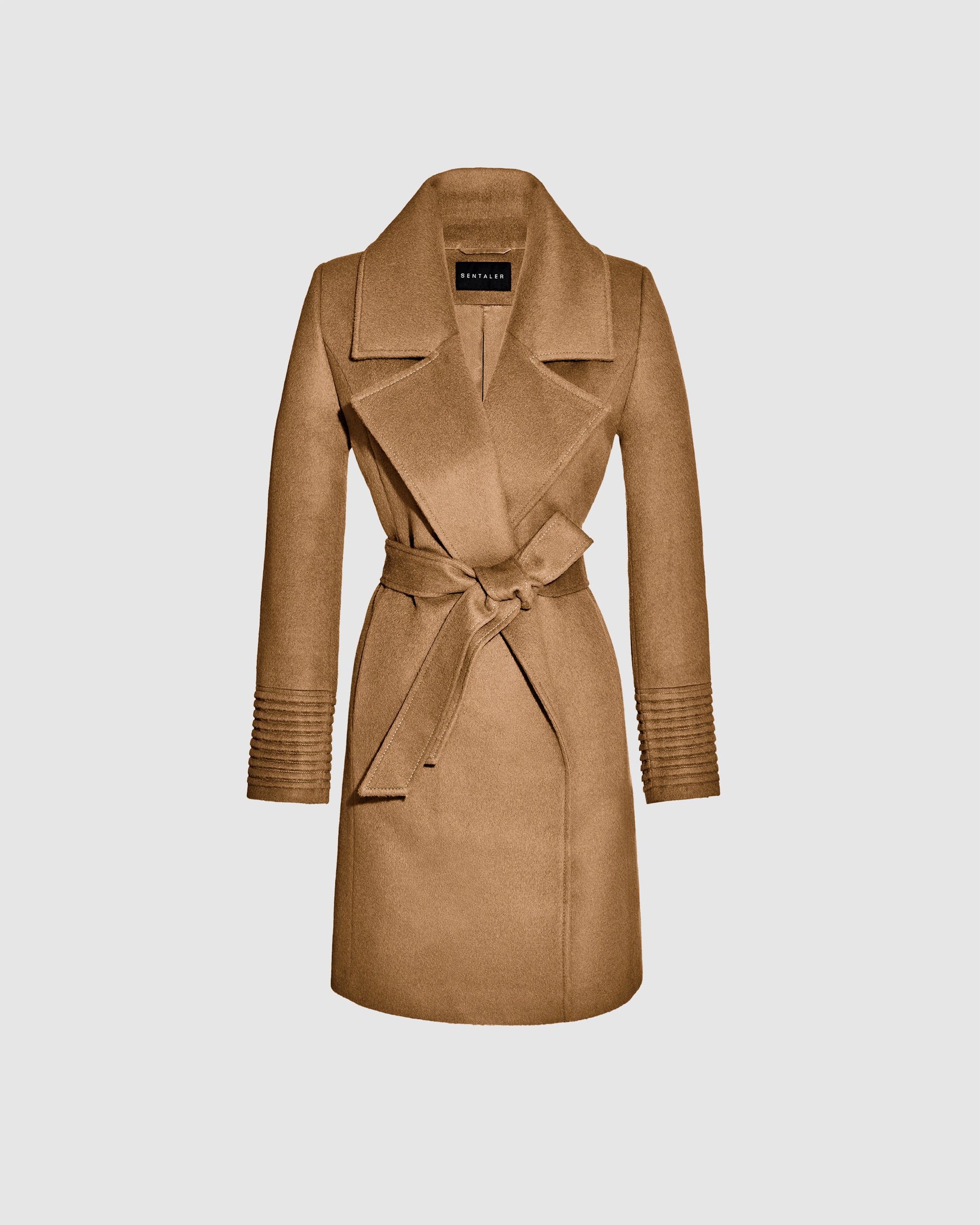 Sentaler mid length dark camel coat made of baby alpaca wool with a large notched collar, belted.