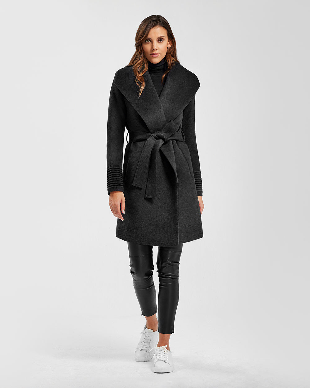 Sentaler Mid Length Shawl Collar Wrap Black Coat in Baby Alpaca wool. Seen from front belted on female model.