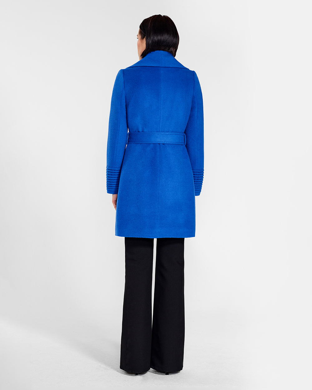 Sentaler Mid Length Shawl Collar Wrap Cobalt Blue Coat in Baby Alpaca wool. Seen from back belted on female model.