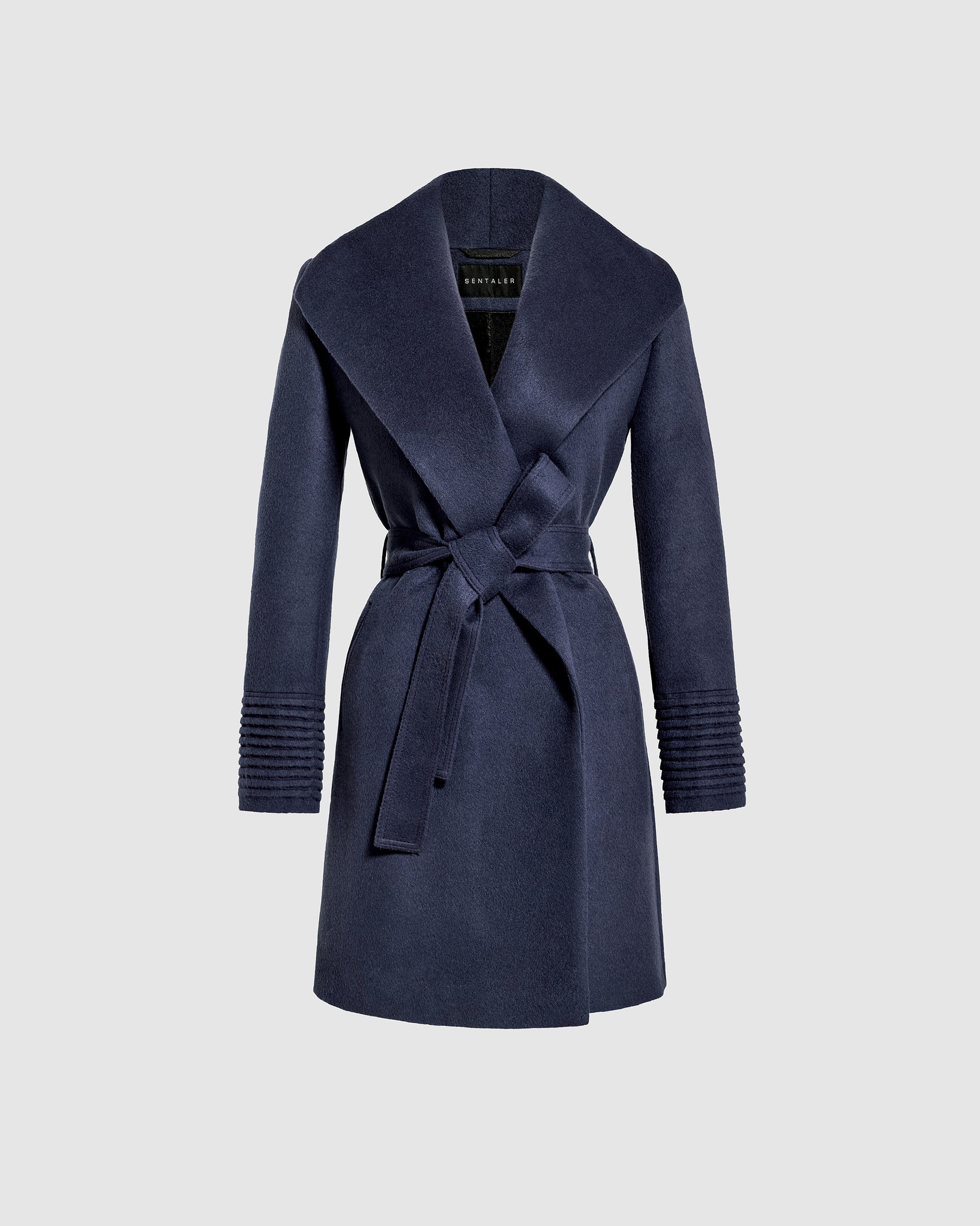 Sentaler mid length deep navy coat made of baby alpaca wool with a shawl collar, belted.