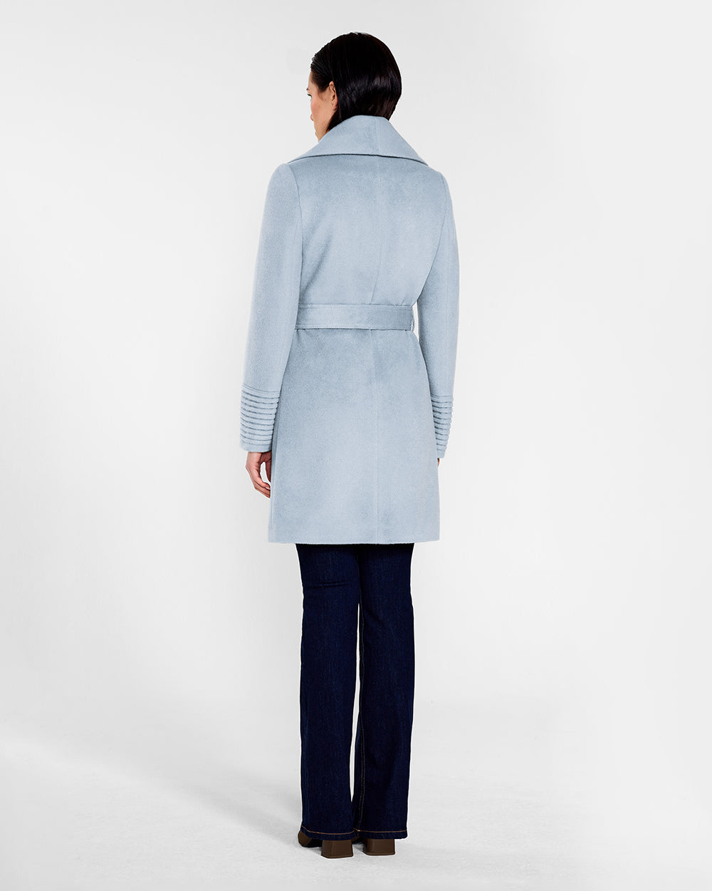 Sentaler Mid Length Shawl Collar Wrap Glacial Blue Coat in Baby Alpaca wool. Seen from back belted on female model.